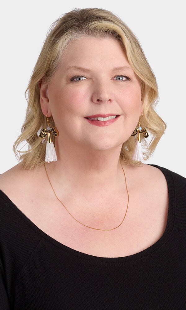 Model showing earrings made with cording